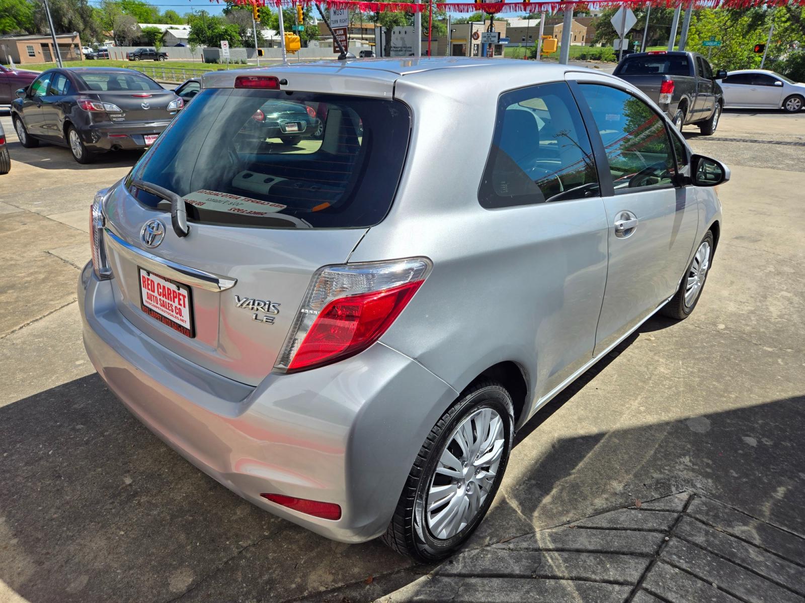 2014 SILVER Toyota Yaris (JTDJTUD37ED) with an 1.5L I4 F DOHC 16V engine, Automatic transmission, located at 503 West Court, Seguin, TX, 78155, (830) 379-3373, 29.568621, -97.969803 - 2014 Toyota Yaris L 3-Door with a 1.5L I4 F DOHC 16V, Automatic, Tilt, Cruise, AM/FM/CD Stereo, Power Windows, Locks and Side Mirrors, Rear Wiper, Rear Defroster and more!! - Photo #2